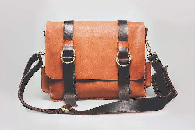 Brown and black luggage bag