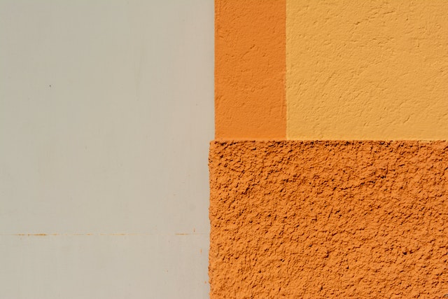 Bricks painted different shades of orange