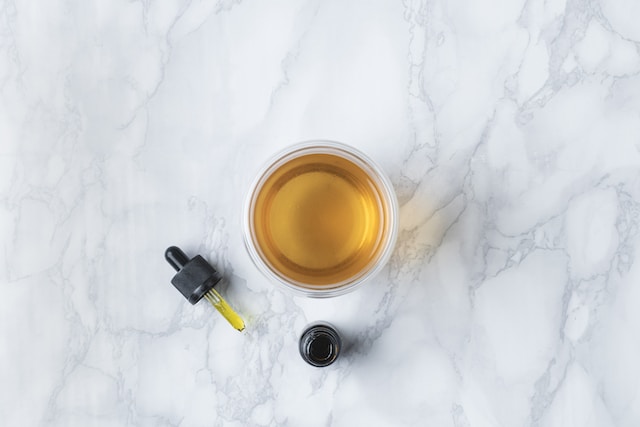 essential oil  in a cup