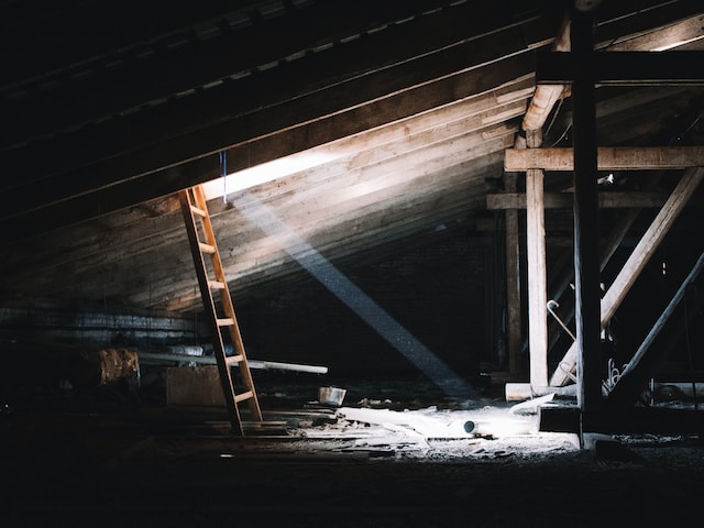 Empty attic with sunlight streaming in