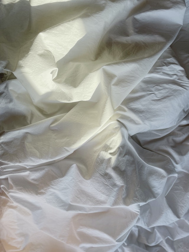 White wrinkled sheets
