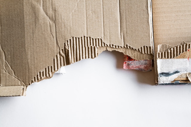 Partially torn brown cardboard