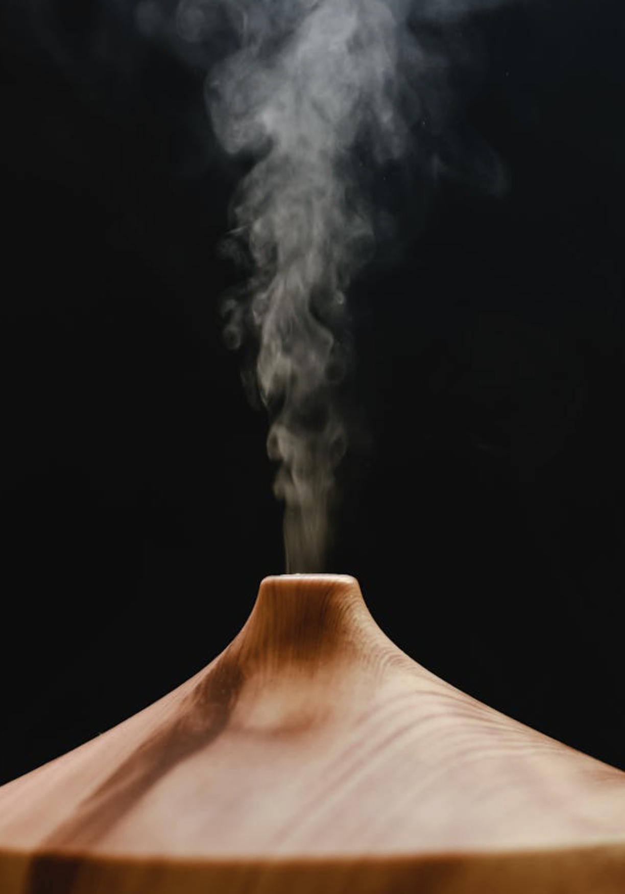 a smoke coming out of a wood object