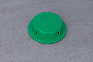 closeup of an open ant bait on a path