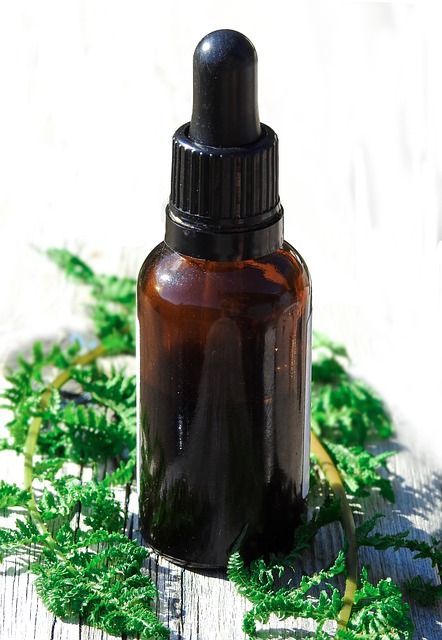 Essential oil bottle, filled with oil, natural flea treatment