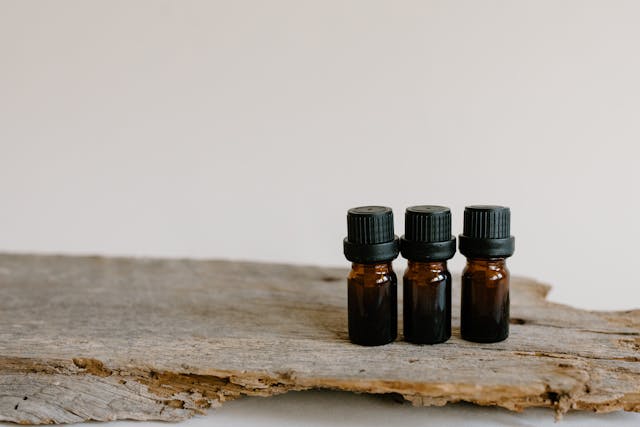 Essential oils on a wooden plank